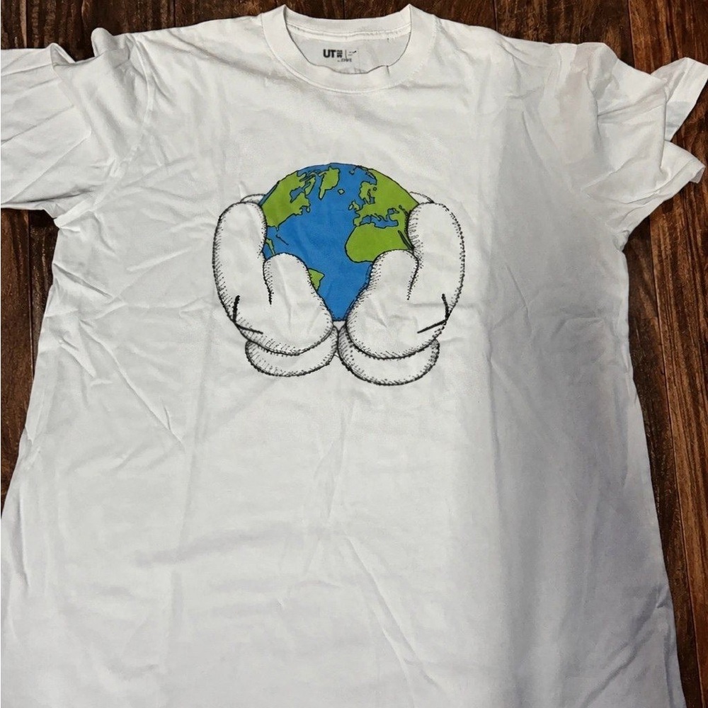 Uniqlo White Tee with Globe and Gloved Hands Graphic